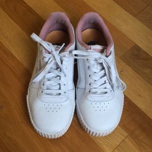 White pumas with pink detail